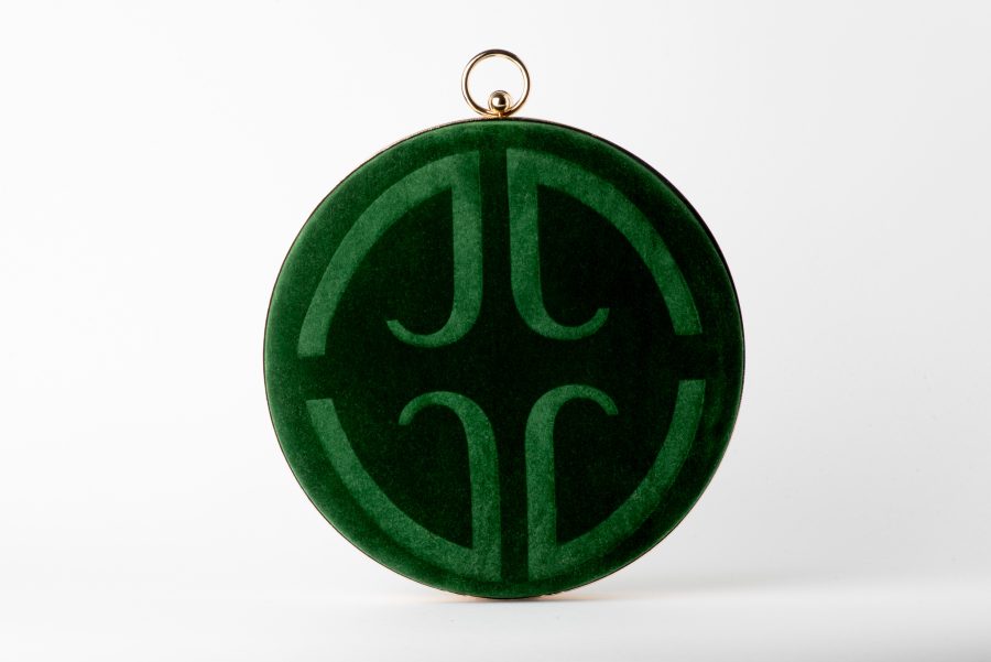 Emerald green round clasp clutch