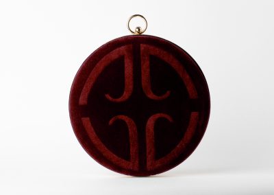 Crimson red round clasp clutch