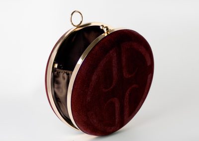 Crimson red round clasp clutch