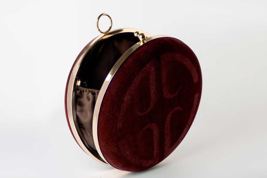 Crimson red round clasp clutch