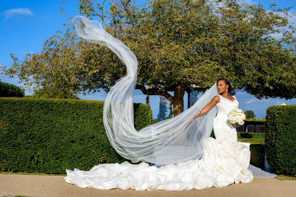 Jacqui James Bride. Satin gown with 2ft long train and catheral veil